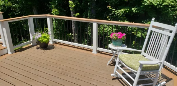 Raised composite deck with rocking chair outdoor furniture